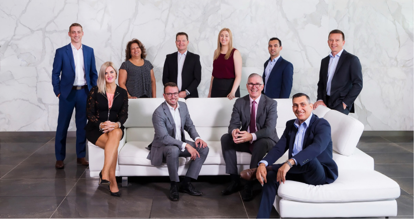Group photography of a team of corporate real estate staff in Sydney CBD.