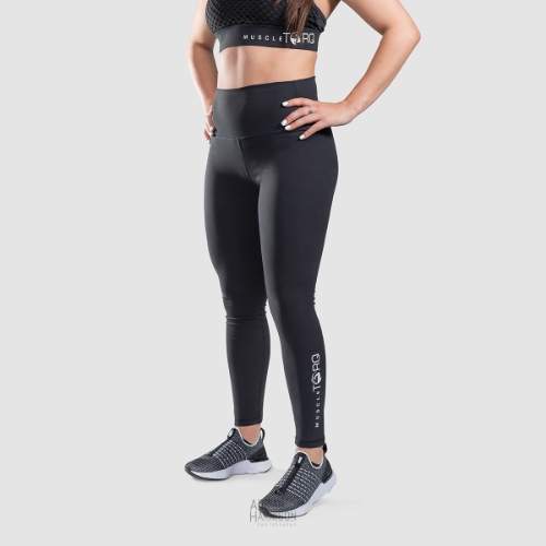 Ecommerce clothing photography of a female model modelling full length leggings for a clothing company,