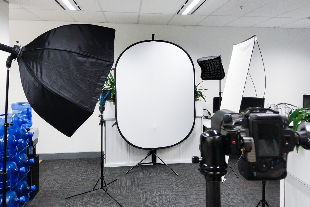Corporate headshot photographer photoshoot setup in a Sydney CBD office.