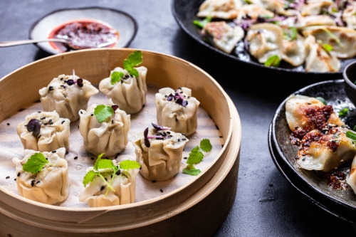 Steamed dumplings arranged by a sydney food stylist ready for food photographer.
