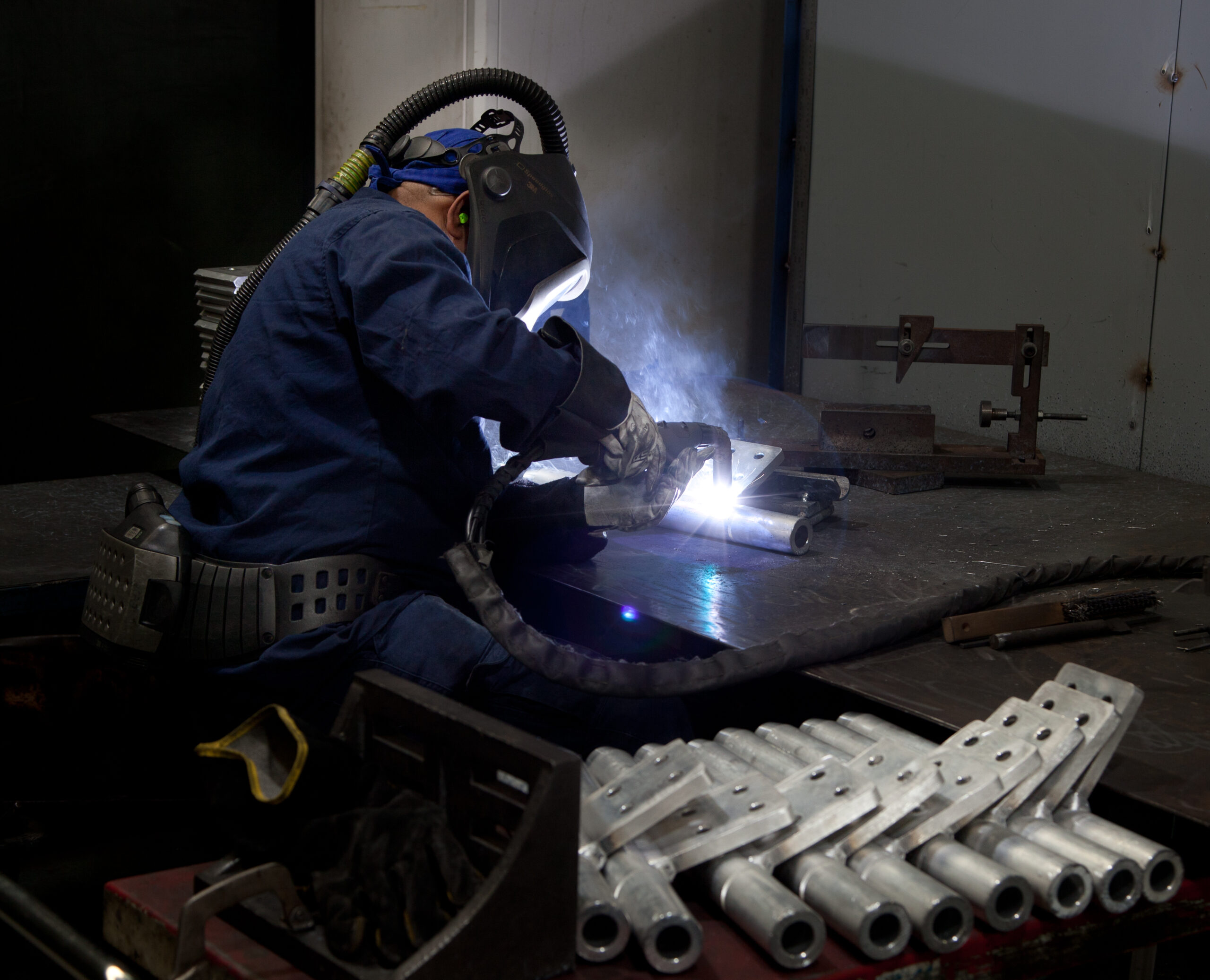 Man welding metal for a Sydney construction site.
